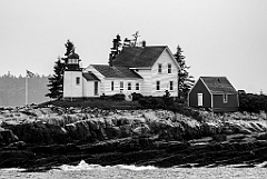 Winter Harbor Light on Rocky Shore of Mark Island -BW